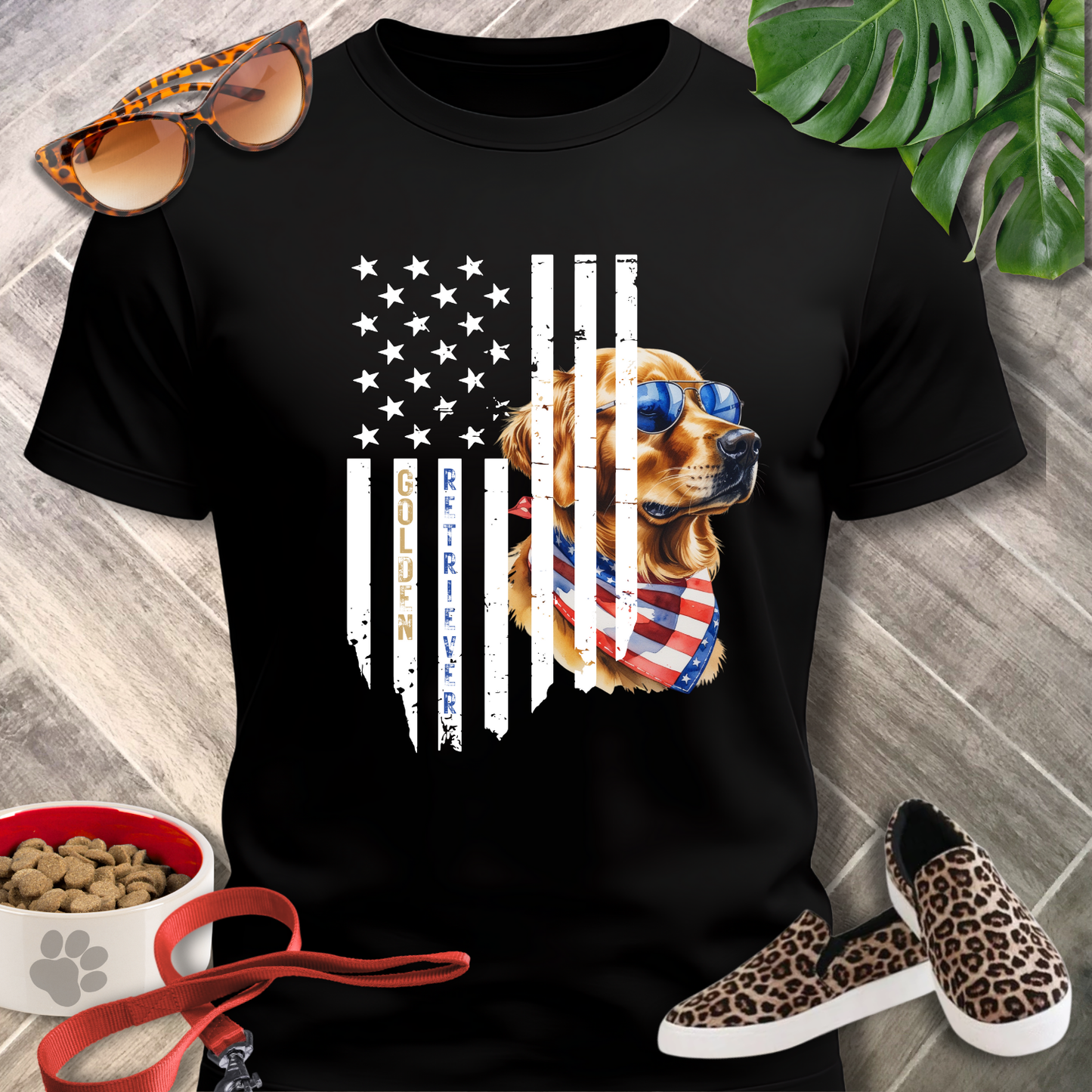Black t-shirt with a dog design featuring an American flag, surrounded by sunglasses, shoes, and pet food.