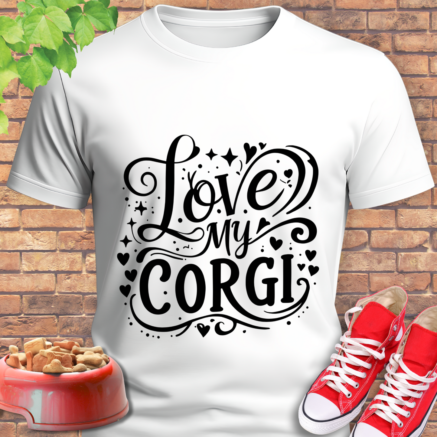White t-shirt with 'Love My Corgi' design, red sneakers, and dog bowl on a brick background