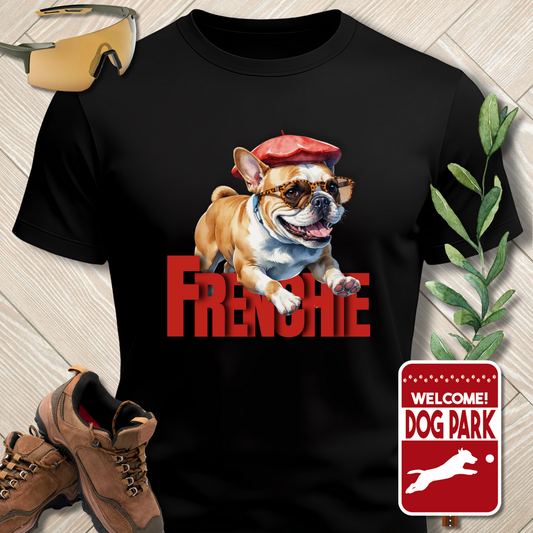 Black t-shirt with a dog graphic and 'Freddie' text, paired with hiking boots and a 'Welcome to the Dog Park' sign.