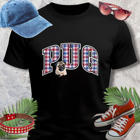 Black t-shirt with 'PUG' in plaid letters, surrounded by a blue cap, red sneakers, and sunglasses on a textured surface.