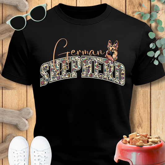Black t-shirt with 'German Shepherd' design on a wooden background