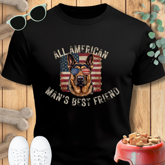 Black t-shirt with a dog graphic and text on a wooden background