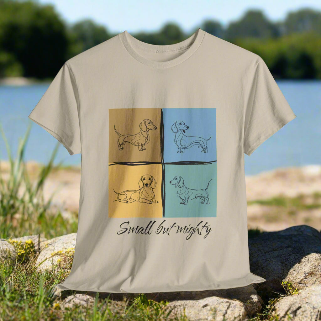 Dachshund shirt Small But Mighty in Sand with four square illustrations of dachshunds and the text 'Small but mighty'