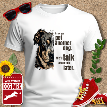 Funny Dog Shirts I Saw You, Talk Later in White t-shirt with dog graphic and text, sunglasses, sneakers, sunflower, and 'Welcome to the Dog Park' sign on a beige background.