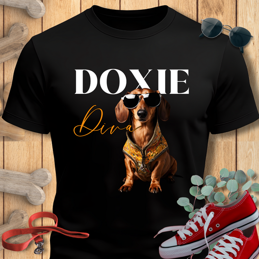 Weeniedog shirts with Doxie Diva Graphic in Black on a wooden surface.